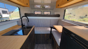 Luxary Interior of Labyrinth Overland Truck Camper Rental