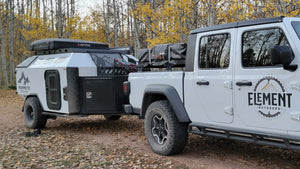 Mammoth Overland Camper in tow with an Element Outdoors Overland Jeep Rental